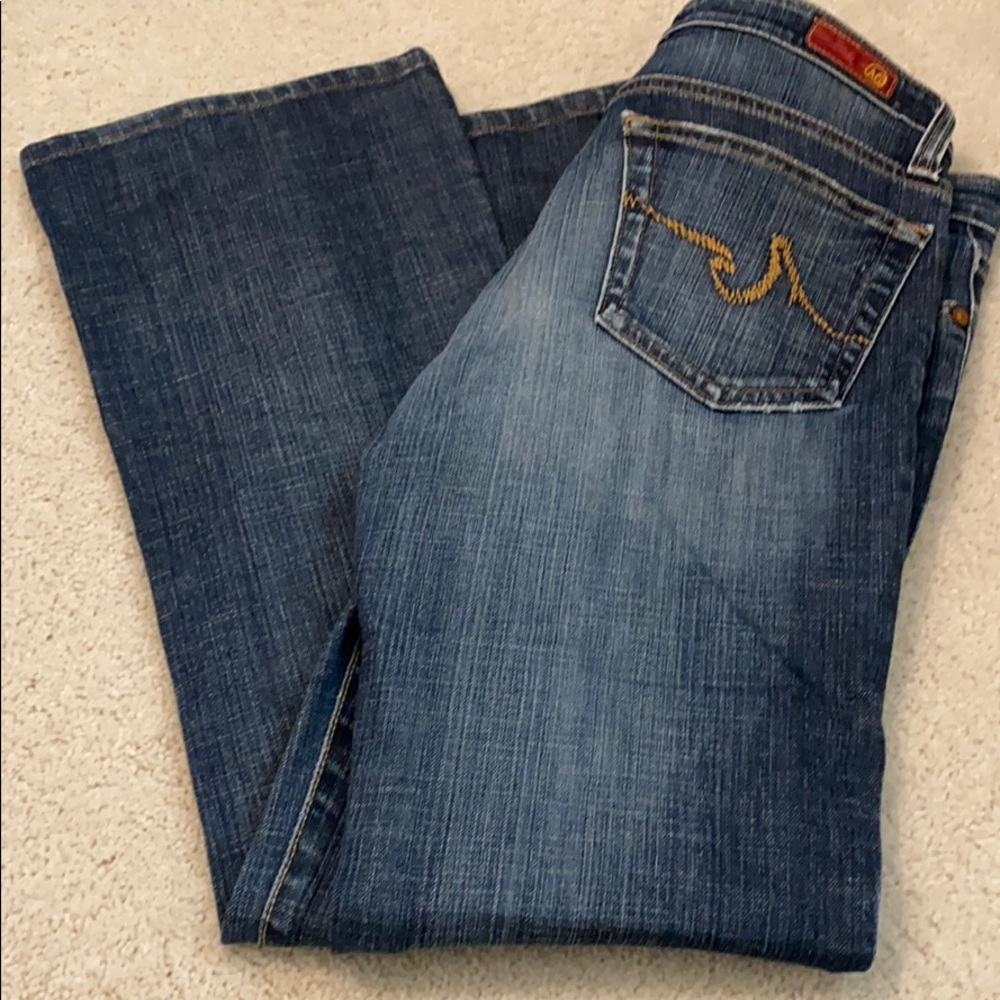 Distressed boot cut jeans